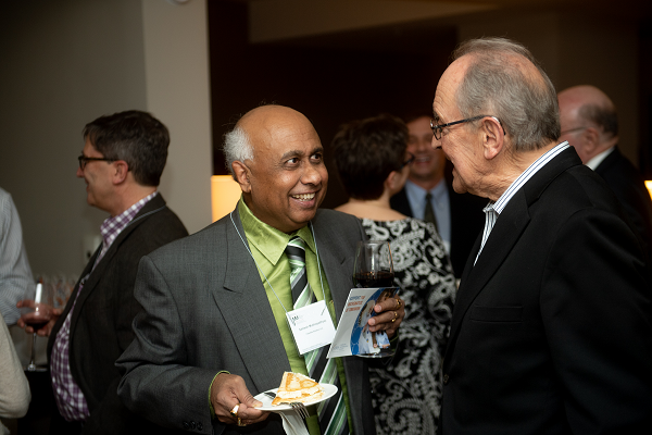 Two donors chatting at reception at 2020 JMM in Denver