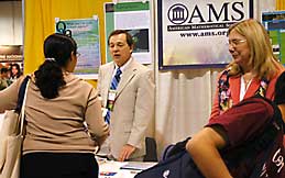 Ellen Maycock and Mike Breen in the AMS booth