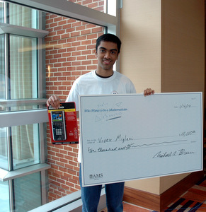 Vivek with his check