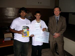 Seemaab and Joseph with their normal-sized TI's and oversized checks